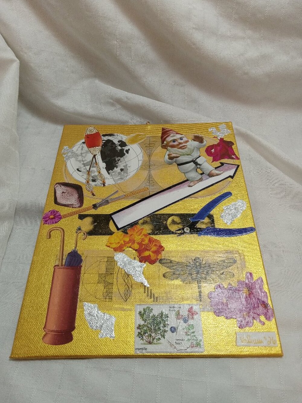 Prints of old magazines on canvas, gold paint, and mixed-media collages